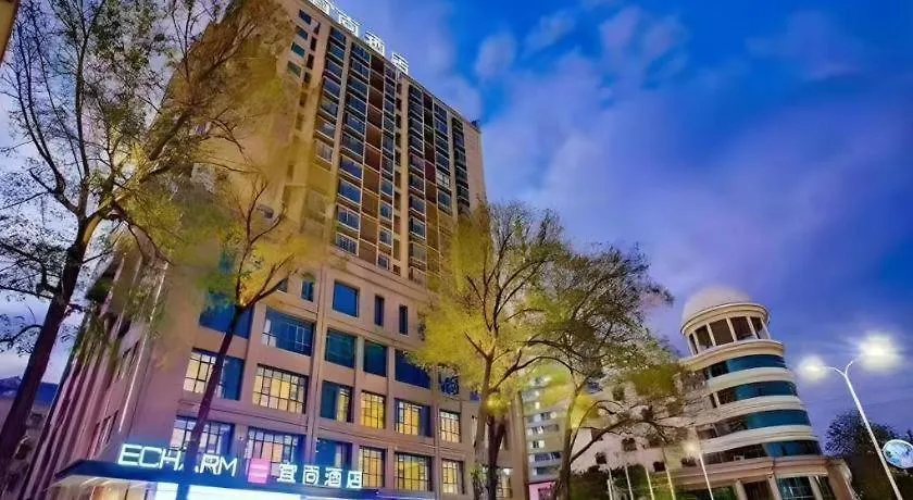 Echarm Hotel Xinyang Xin County Hszinhszien 3*,  Kína