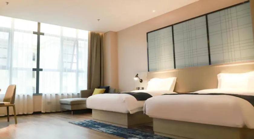 Echarm Hotel Xinyang Xin County Hszinhszien Kína