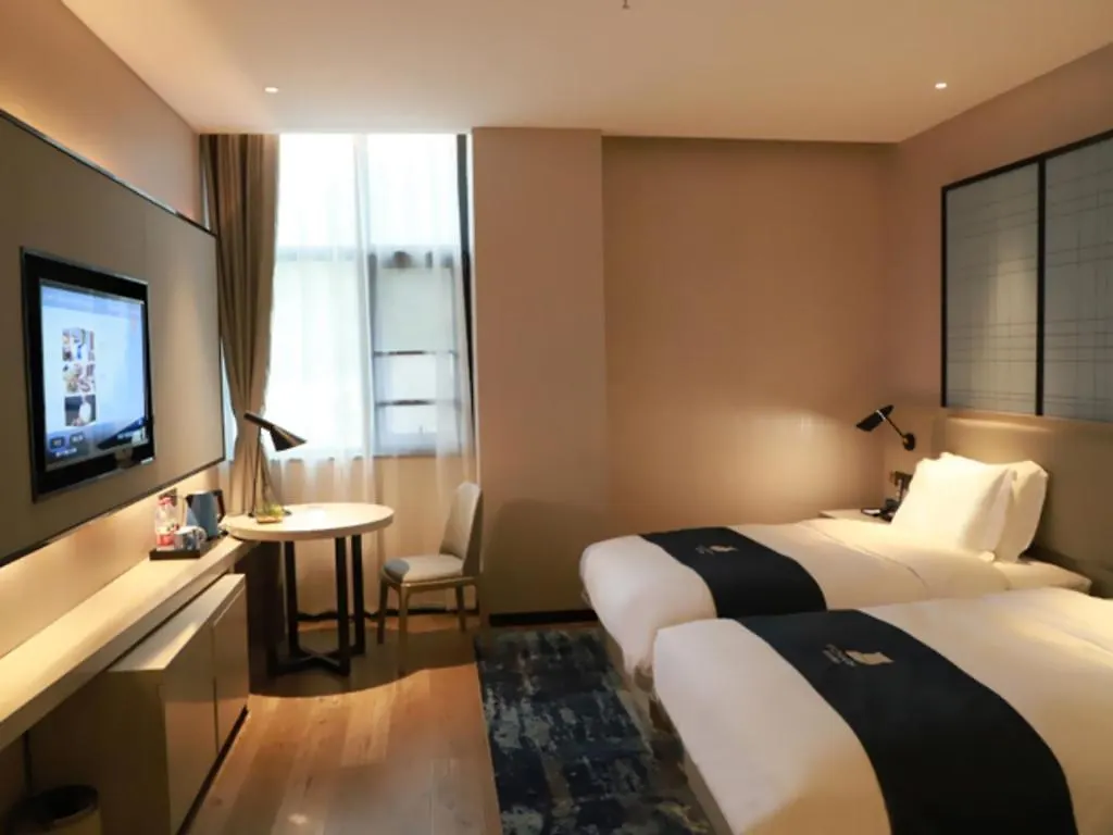 Echarm Hotel Xinyang Xin County Hszinhszien Kína